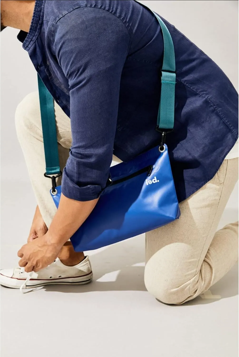 iod Weatherproof Sling Bag/Crossbody Bag with Water-Resistant Zipper - Tarpaulin Bag with Adjustable Shoulder Straps (Silver, M)