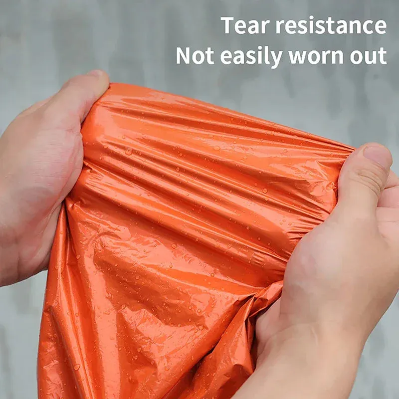 Portable reflective hiking poncho