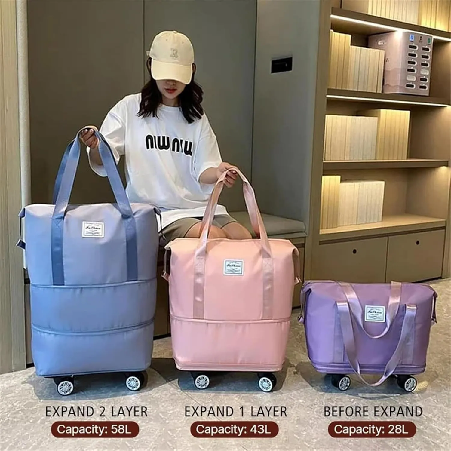Travel Bag with Wheels - Expandable Foldie Wheeled Duffel 28-58L, Spinner Wheels, Waterproof - Perfect Carry On Luggage for Weekend Trips, Gym, Camping (Pink)
